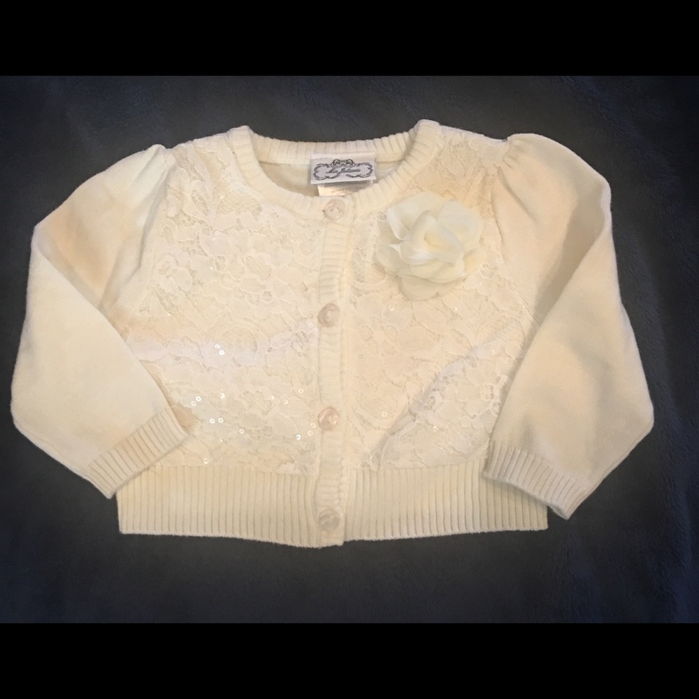 Never worn. Baby Girls 12 Months fancy cardigan.